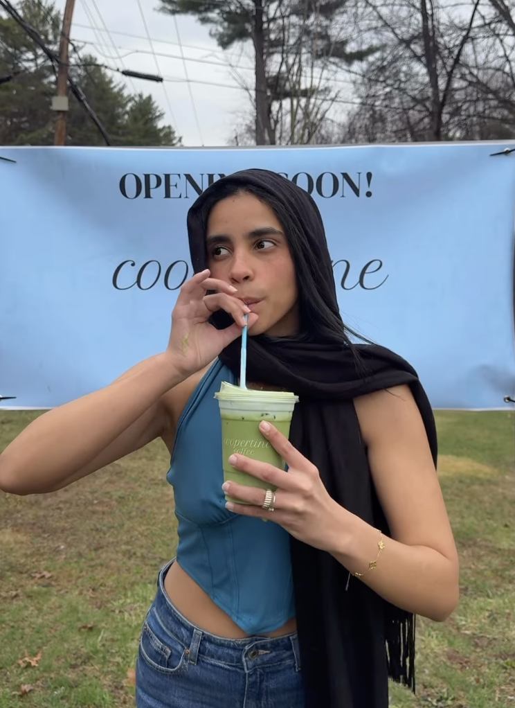 Coopertine Matcha founder enjoying a matcha latte
